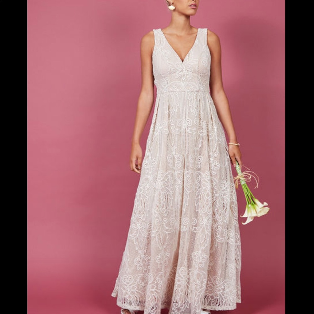 White lace sheath wedding dress.
